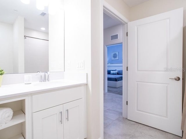 bathroom with vanity and walk in shower