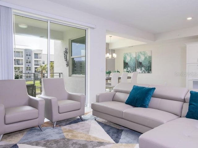 living room with a notable chandelier