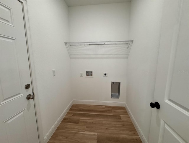 laundry room featuring hookup for an electric dryer, washer hookup, and hardwood / wood-style floors