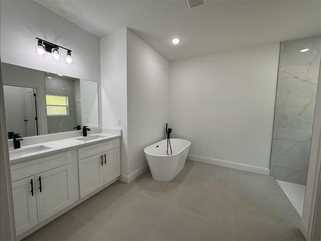 bathroom featuring tile flooring, a bathing tub, and double sink vanity