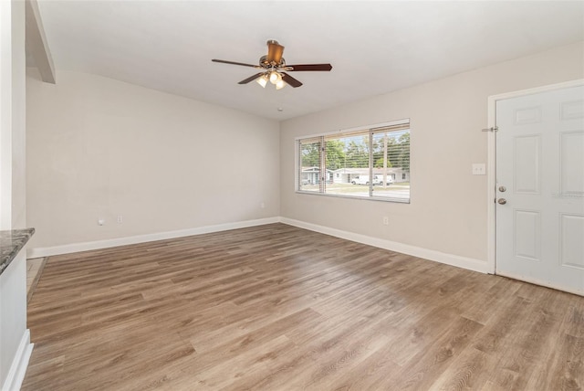 interior space with light hardwood / wood-style floors and ceiling fan