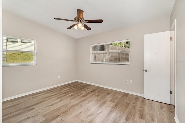 unfurnished room featuring ceiling fan and light wood-type flooring