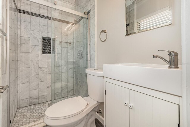 bathroom with an enclosed shower, radiator, and toilet