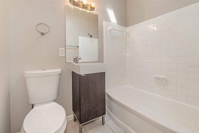 full bathroom with tile flooring, large vanity, shower / bathing tub combination, and toilet