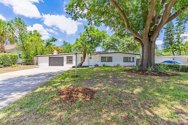 ranch-style house with a front yard