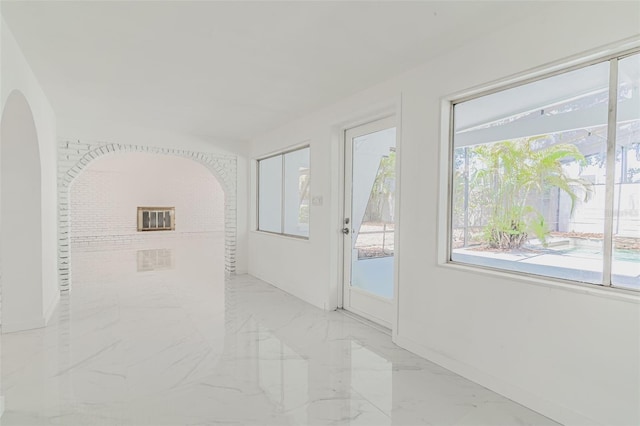 spare room featuring light tile floors