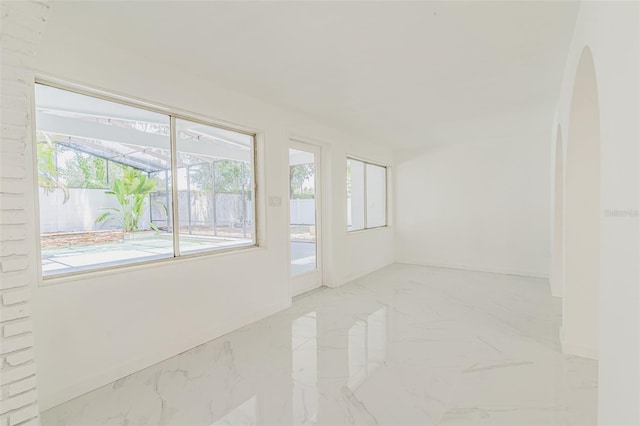 empty room with light tile flooring