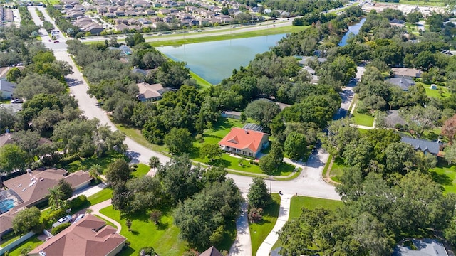 birds eye view of property featuring a water view