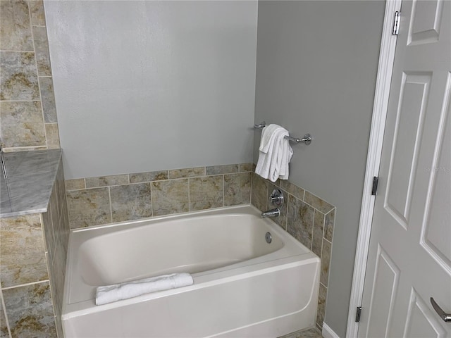 bathroom featuring a tub to relax in