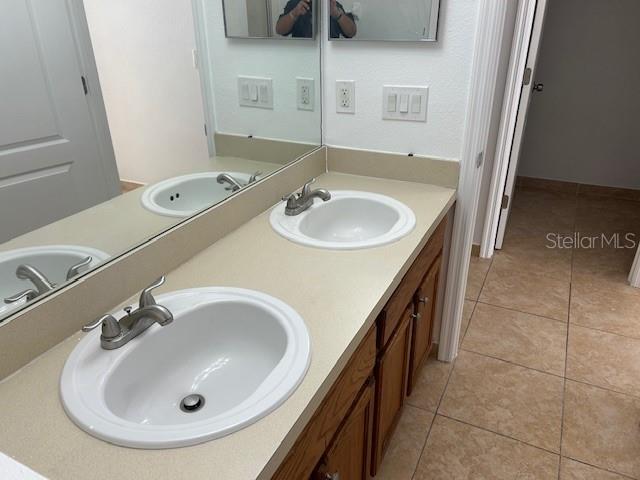 bathroom featuring vanity and tile patterned floors