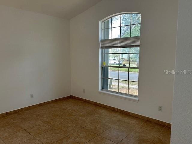 empty room featuring light tile patterned flooring