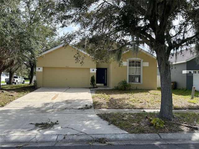 single story home with a garage