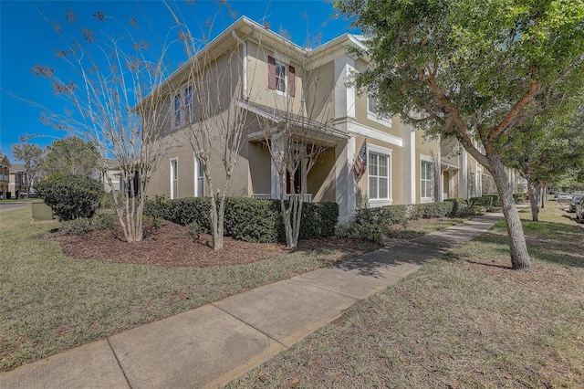 view of front of house with a front lawn