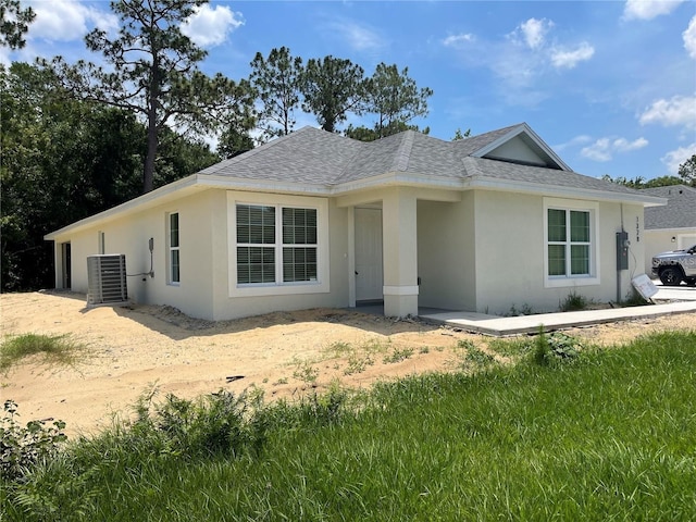 view of front of home featuring central air condition unit