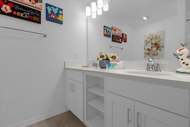 bathroom featuring double sink vanity and tile flooring