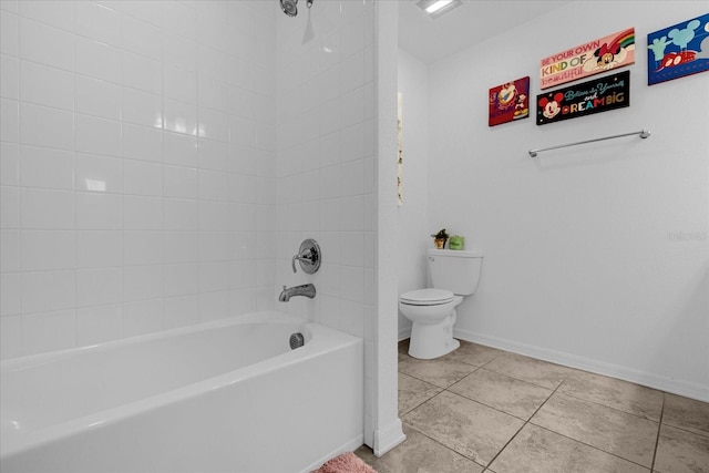 bathroom featuring tile floors and toilet