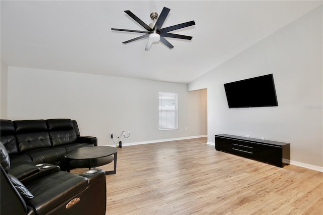 living room featuring light hardwood / wood-style floors, ceiling fan, and lofted ceiling