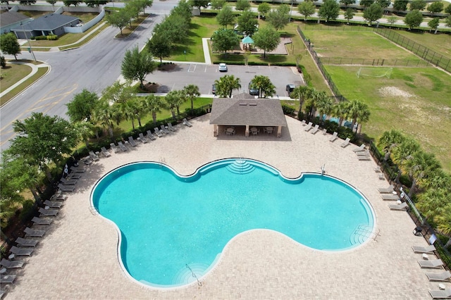 view of swimming pool featuring a patio area