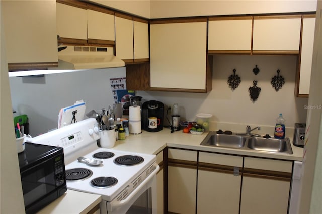 kitchen with custom exhaust hood, electric stove, and sink