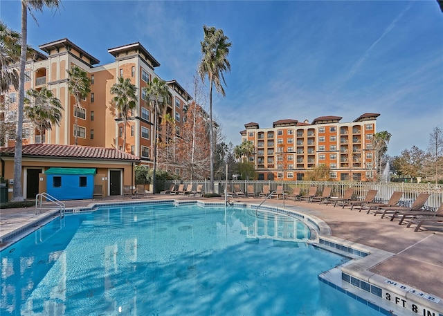 view of swimming pool featuring a patio area