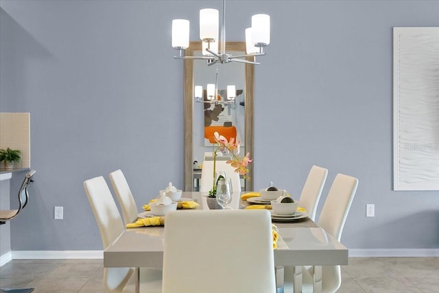 dining room featuring light tile floors