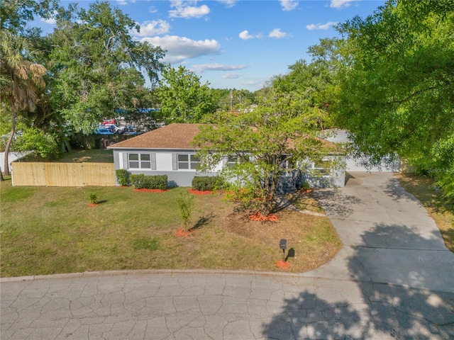 single story home with a front yard