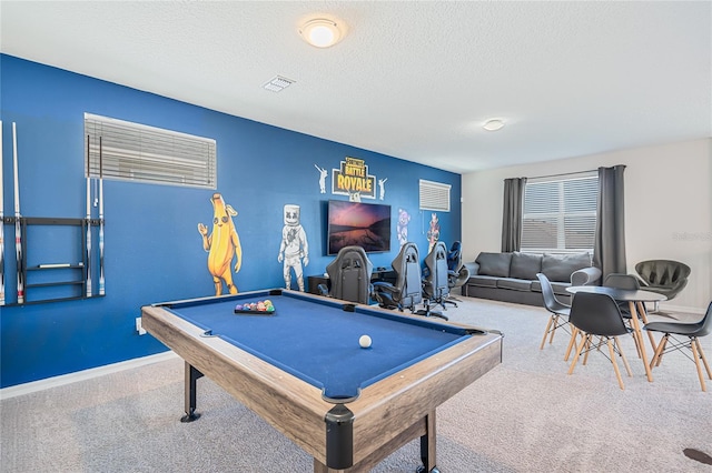 rec room with a textured ceiling, pool table, and carpet