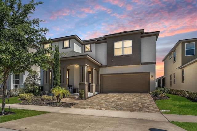 view of front of property featuring a garage