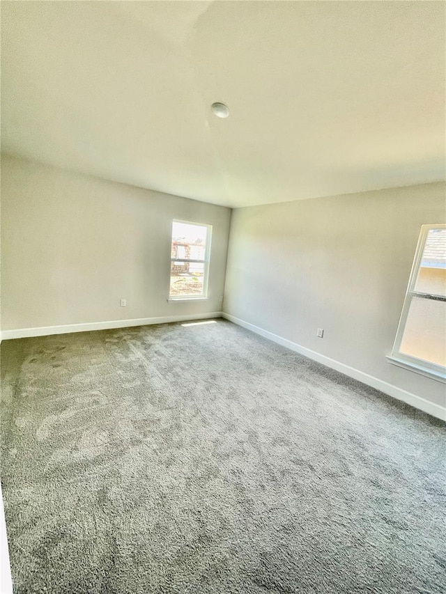 spare room featuring carpet flooring