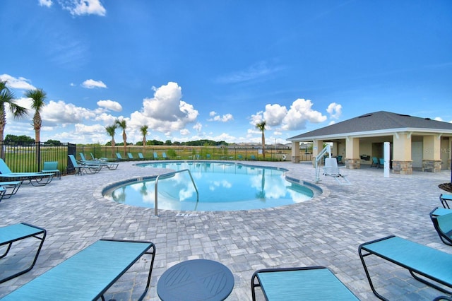 view of pool featuring a patio area