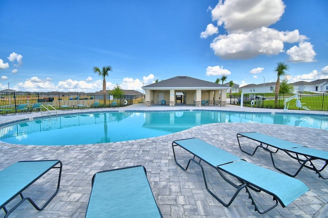 view of swimming pool featuring a patio