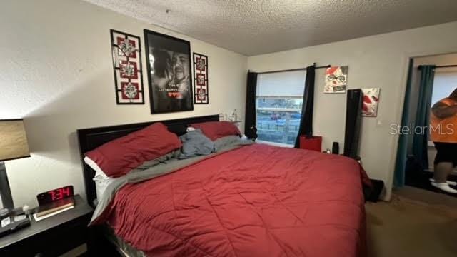 bedroom with a textured ceiling