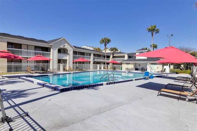 view of swimming pool featuring a patio