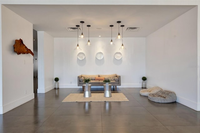 interior space with dark tile floors