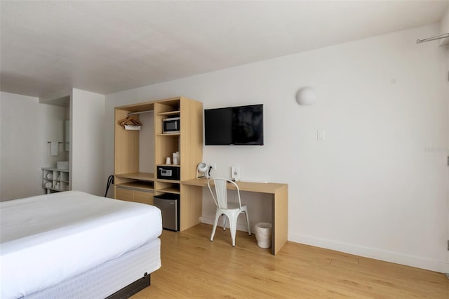 bedroom featuring light wood-type flooring