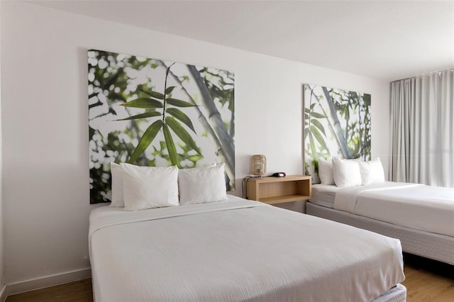 bedroom featuring hardwood / wood-style floors