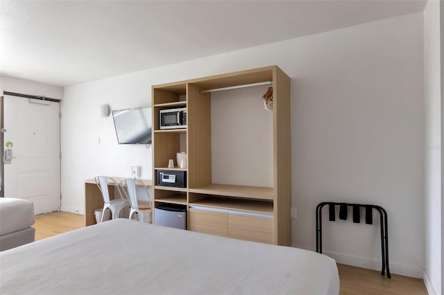 bedroom featuring light hardwood / wood-style floors