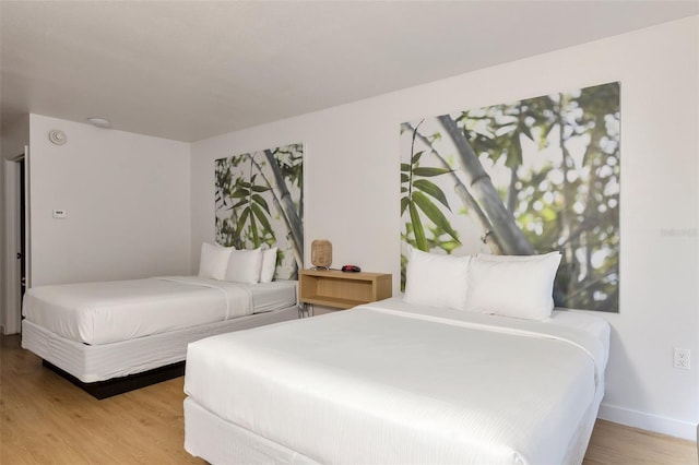 bedroom with light wood-type flooring