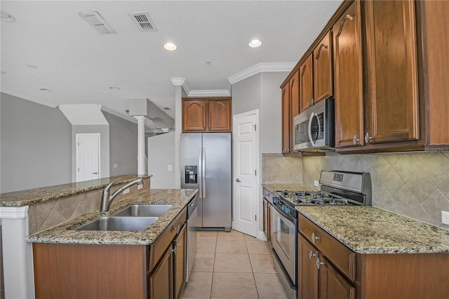 kitchen featuring stone counters, sink, stainless steel appliances, light tile floors, and tasteful backsplash