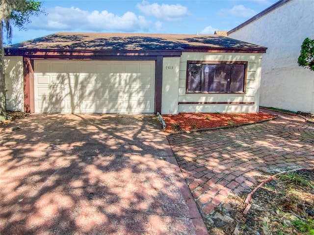 exterior space with a garage