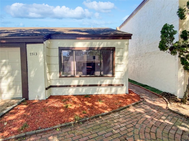 exterior space with a garage