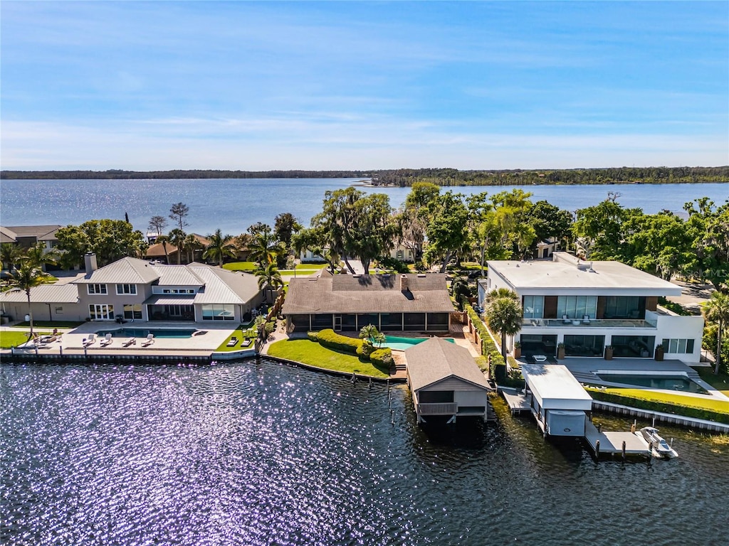 birds eye view of property featuring a water view