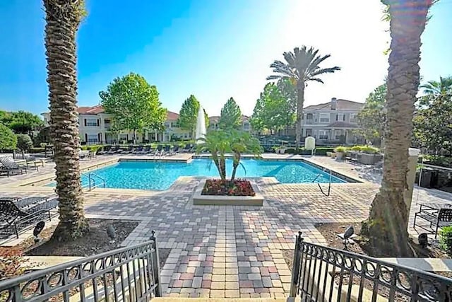 view of swimming pool featuring a patio