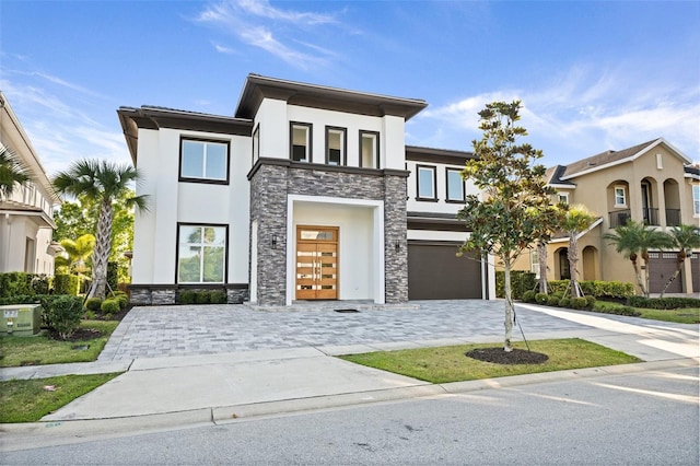 modern home featuring a garage