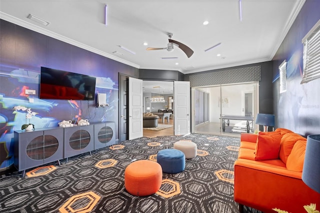 living room featuring crown molding, ceiling fan, and washer / dryer