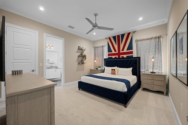 bedroom featuring ensuite bathroom, ornamental molding, light colored carpet, and ceiling fan with notable chandelier