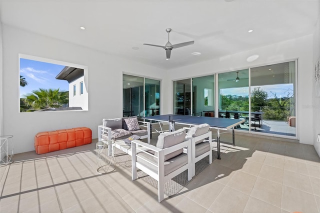 view of patio featuring an outdoor hangout area and ceiling fan