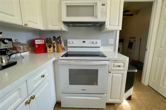 kitchen with white cabinetry, white appliances, ceiling fan, and light tile floors