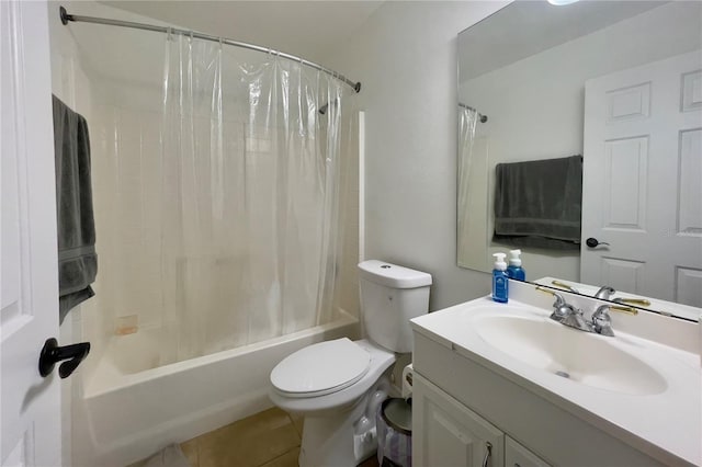 full bathroom with vanity, tile floors, shower / tub combo with curtain, and toilet