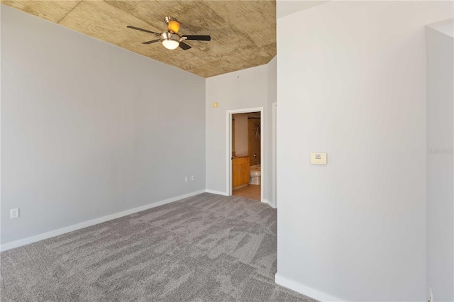 unfurnished room with ceiling fan and light colored carpet